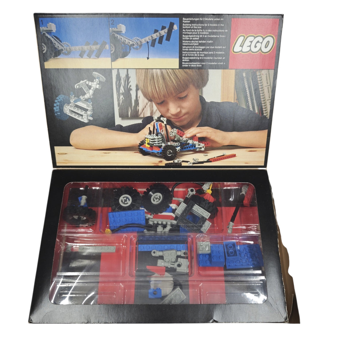 Originalverpackung und die Anleitung LEGO Technic 8841 Dune Buggy Desert Racer 1983