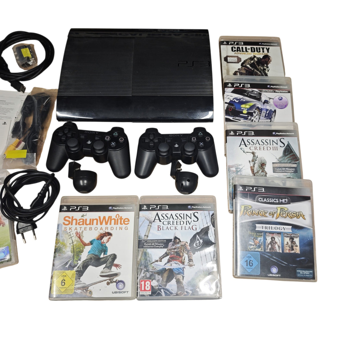 Bundle einer Sony PlayStation 3 Super Slim 500gb Modell 4004c zwei Controllern