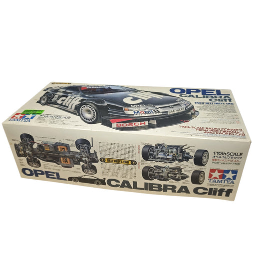 Tamiya 1/10 R/C Opel Calibra Cliff (TA03F Chassis) Modellbausatz (Art.-Nr. 58188) mit charakteristischer schwarz-grüner Cliff-Tourenwagen-Grafik
