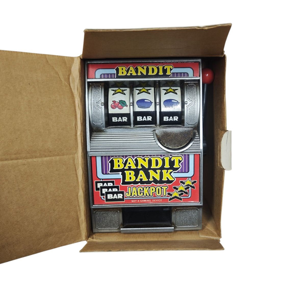 mechanische Spardose im Design eines einarmigen Banditen (Spielautomaten), die typischerweise als Vintage-Sammelobjekt