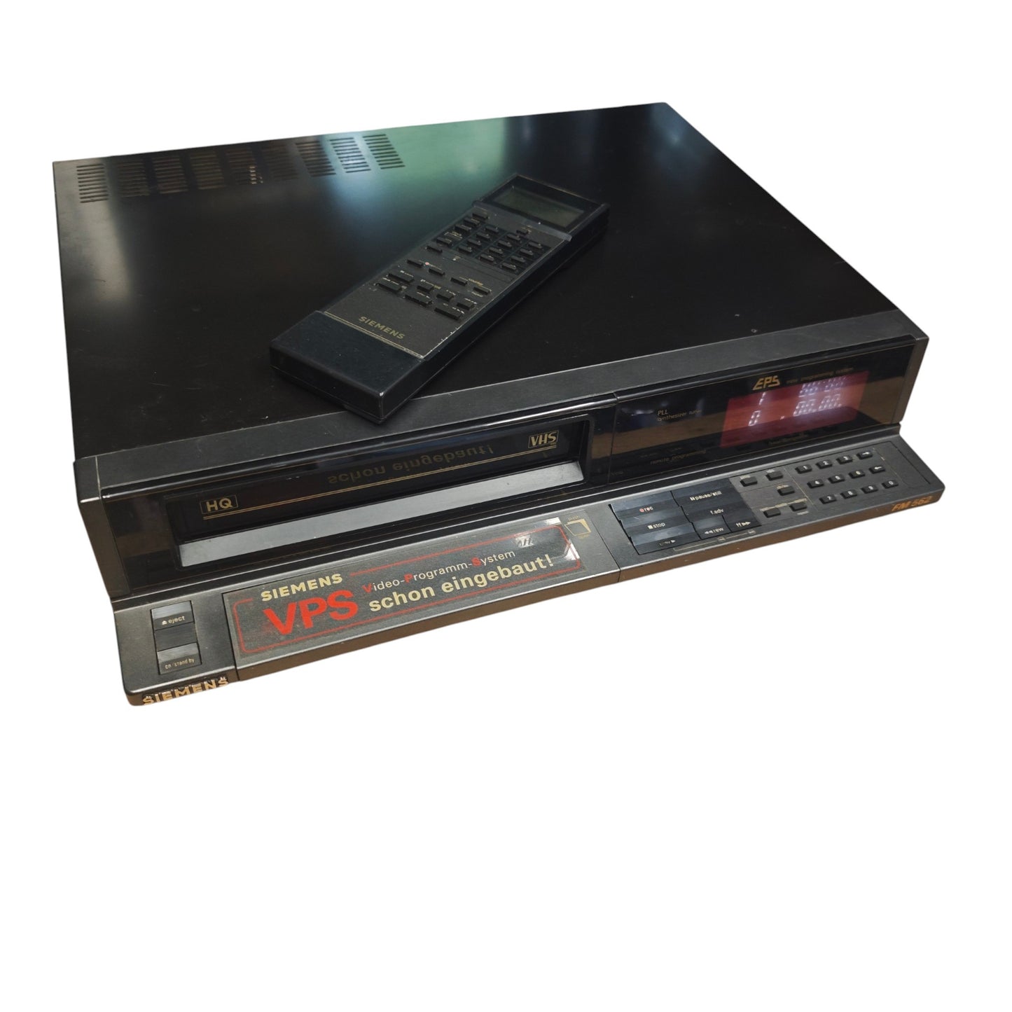 VHS-Videorekorder (Modellreihe FM 500 mit integriertem VPS-System inklusive der original Infrarot-Fernbedienung.